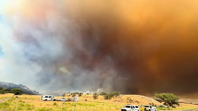 California's largest blaze explodes in size as dry, hot weather raises wildfire risk statewide